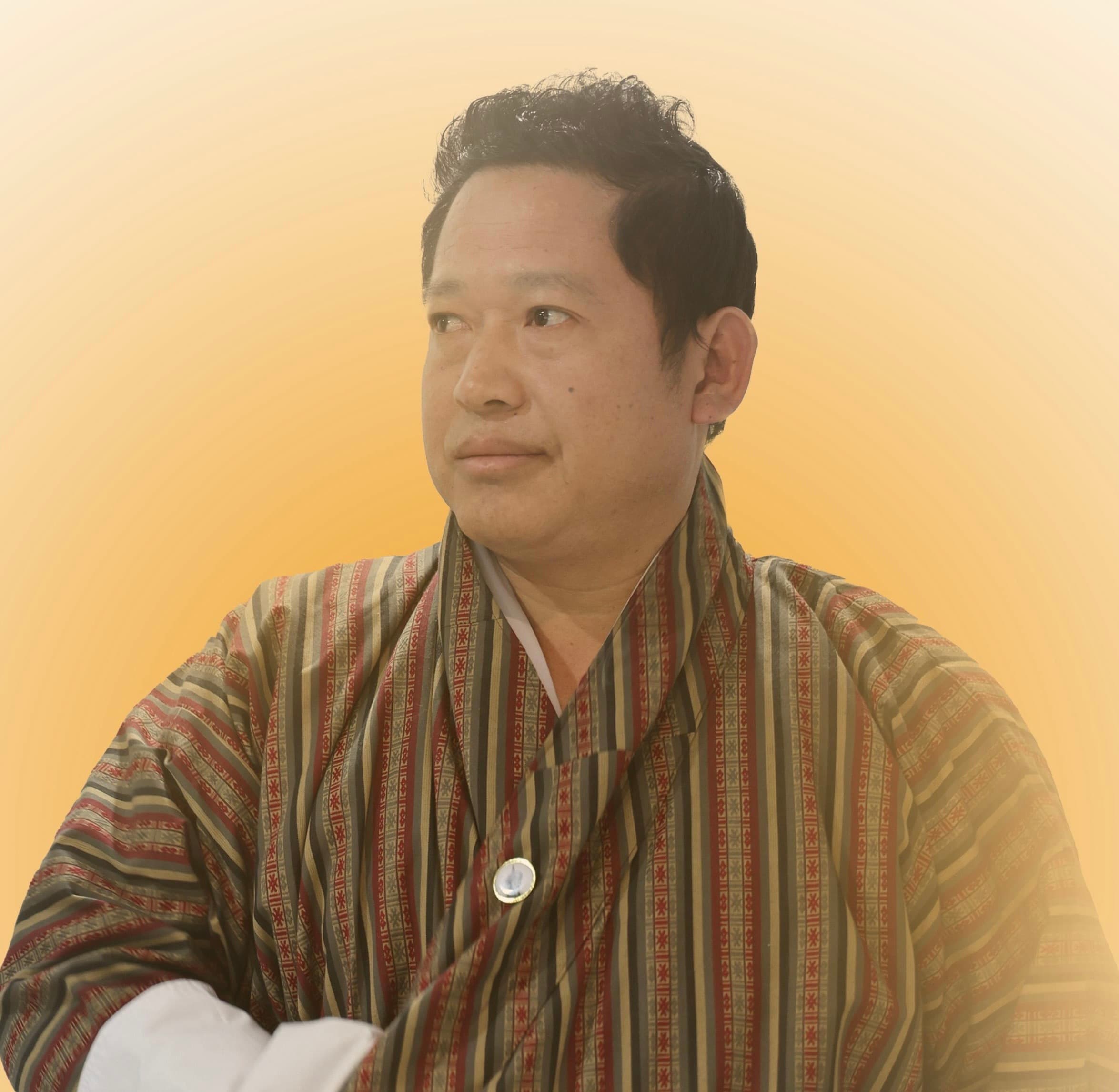 Kencho Tempa in a reflective portrait representing the vision and warmth behind Brokshi With Kencho.